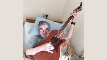 Uddingston care home Resident reconnects with his musical pastimes